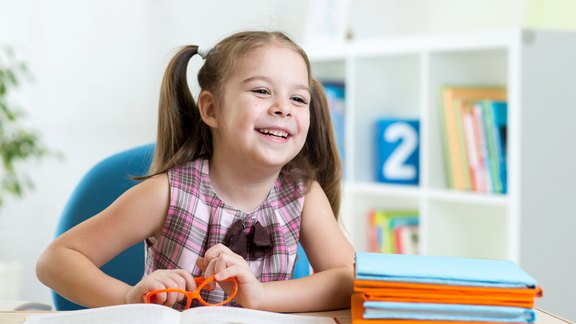 laughing girl with two pigtails